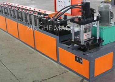 ประเทศจีน Automatic Hydraulic Galvanized Cold Steel Shop Slat Roller Shutter Door Roll Forming Machine ผู้ผลิต